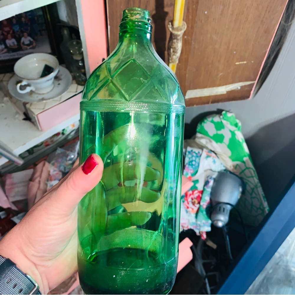 Green glass bottle. Very beautiful.